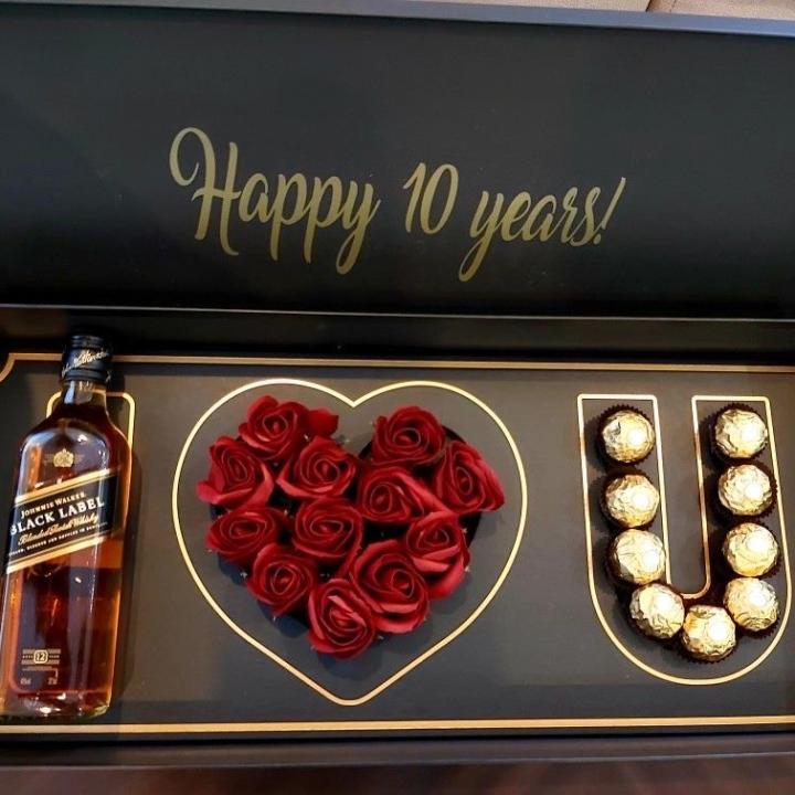 box of whiskey and money
