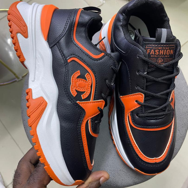 Tennis hommes noire et orange