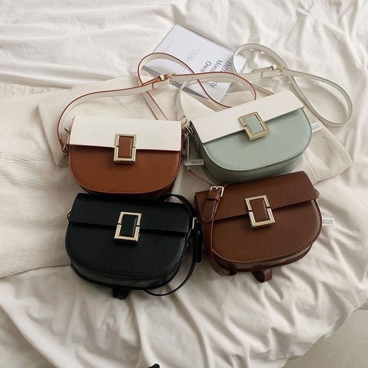 ✨ *Chic & Moderne*   Ce sac à bandoulière camel séduit par sa forme arrondie, sa boucle carrée dorée et sa finition lisse. Parfait pour un look élégant et décontracté au quotidien.