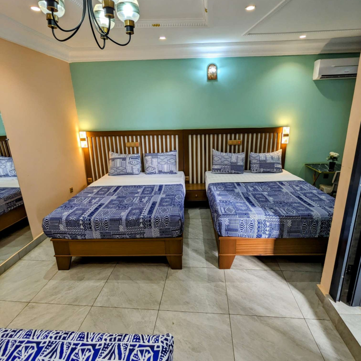 Chambre twin à 3 lits