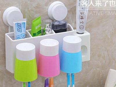 Toothbrush/toothpaste hanger
