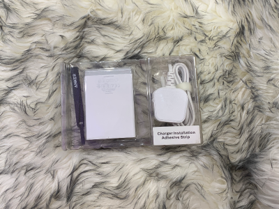 Charger installation adhesive strip