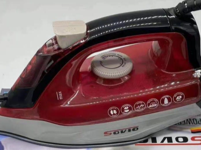 Stylish red and white steam iron