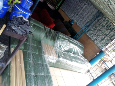 Green L - Shaped sofa