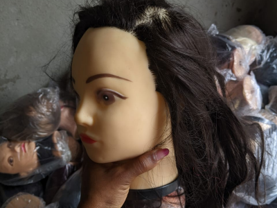 Tête de poupeé