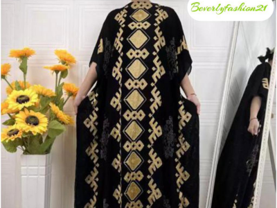 Black robe shiny gold