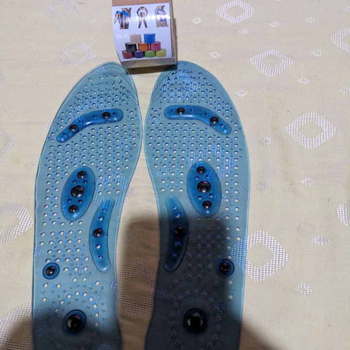 Kinesiotape and reflexology foot insoles