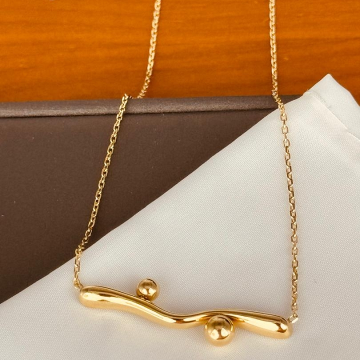 collier doré 🥰