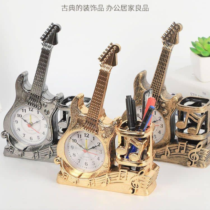 Alarm clock and pen holder