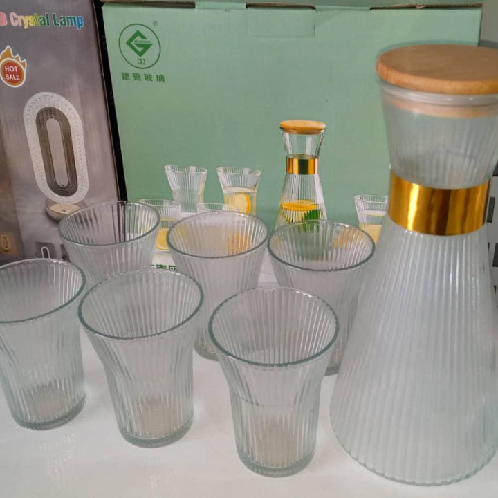 Jar with drinking glasses