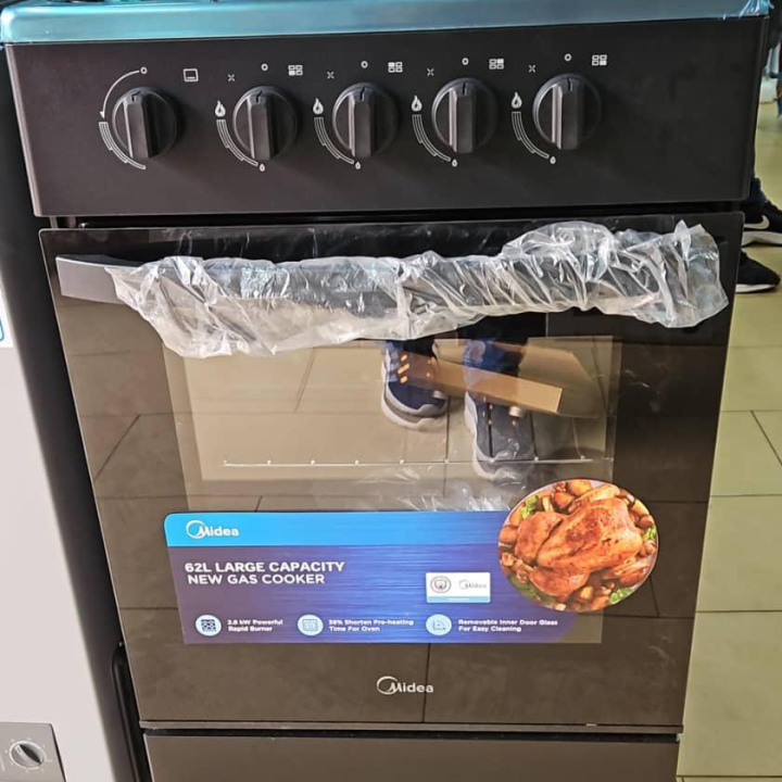 cuisiniere a gaz midea 4 foyers 50x50 avec four