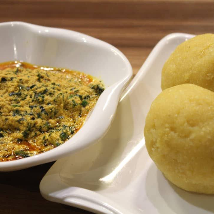 Egusi soup with bone meat and garri/fufu